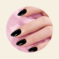 showing MAGNIFIQUE semi cured gel stickers on hand