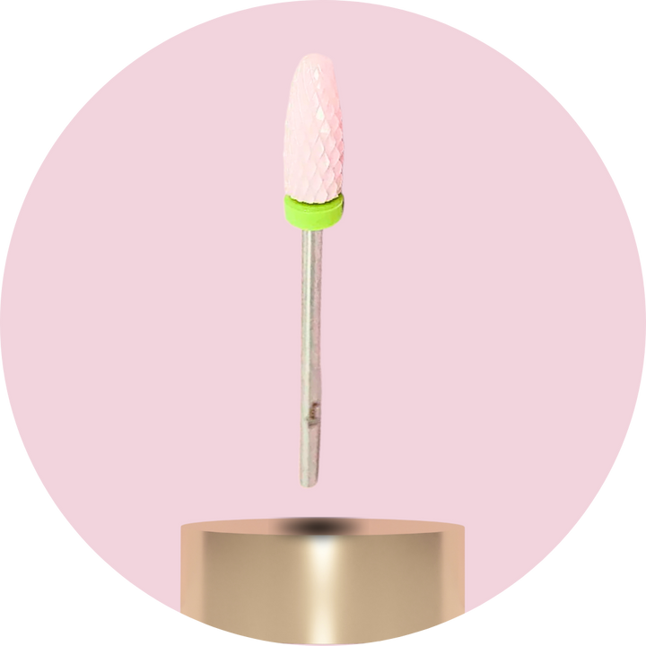 Nail drill bit with pink ceramic wheel on a pink background