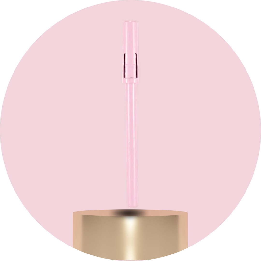 Pink and gold cylindrical product on a pink background
